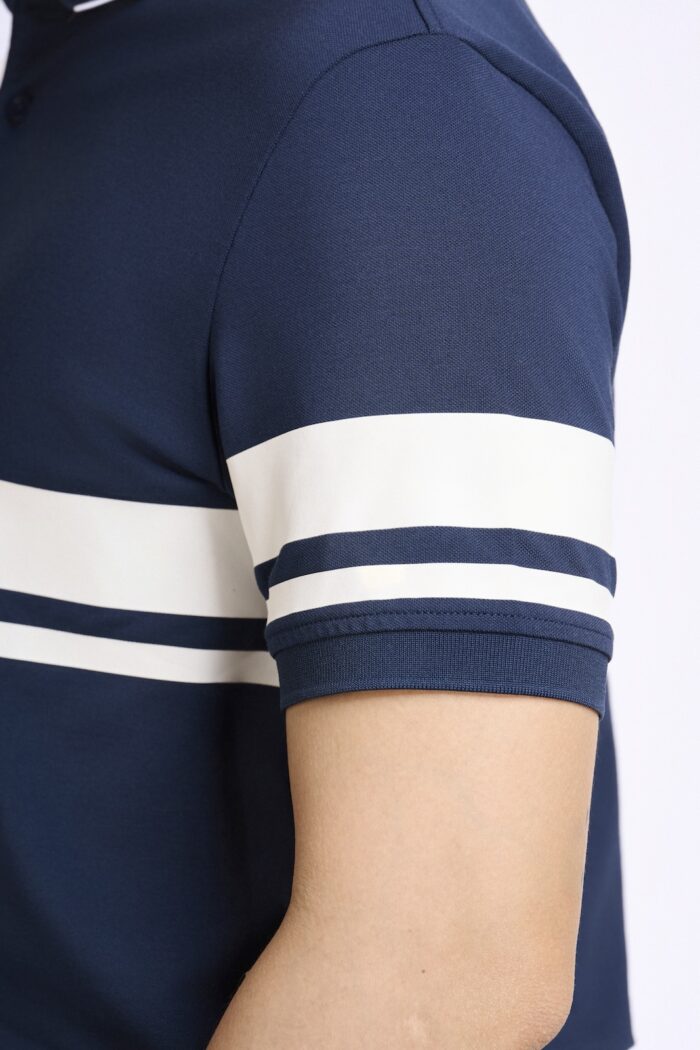 KP057 ao polo phoi soc ngang mau xanh navy soc trang can vai